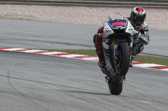 Lorenzo edges out Pedrosa to take pole