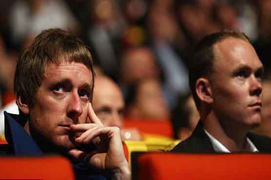 Wiggins faces tough defence of title 