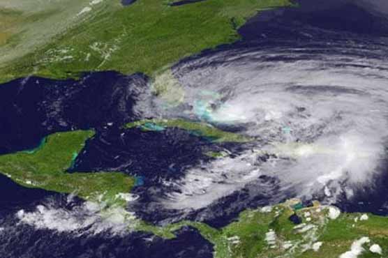 Hurricane Sandy kills 21 in Caribbean, takes aim at US