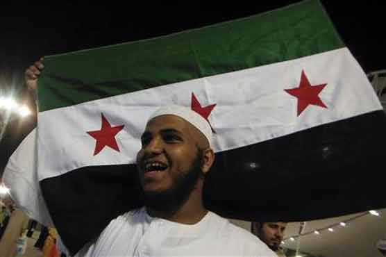 Syrian pilgrims shout anti-Assad slogans 
