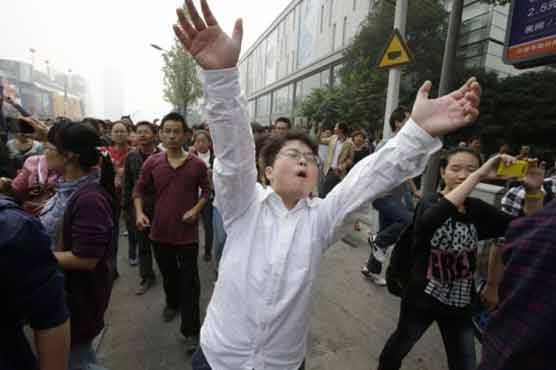 Chinese protest factory even after official pledge 