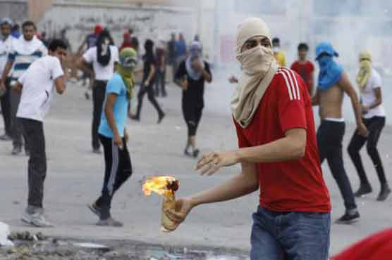 Bahrain bans protests amid violence