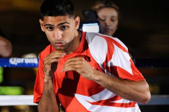 Amir Khan says he's thriving after Roach split
