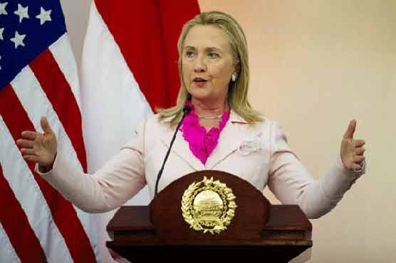 Clinton warns against use of force in South China Sea 