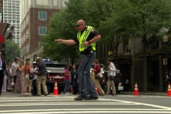 Dancing police officer directs traffic 