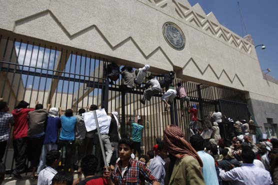 US missions stormed in Yemen, stoned in Egypt film protest