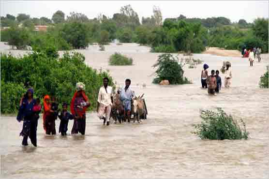 Badin: Streets, roads remain submerged in water