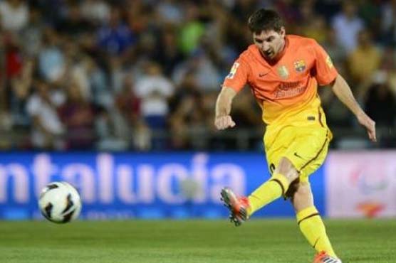 Messi at double as Barca thrash Getafe to stay top