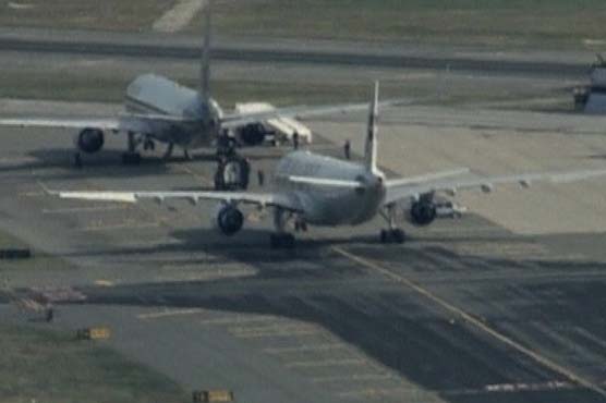 2 jets at JFK airport searched after bogus threats