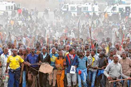 South Africa miners refuse to end strike