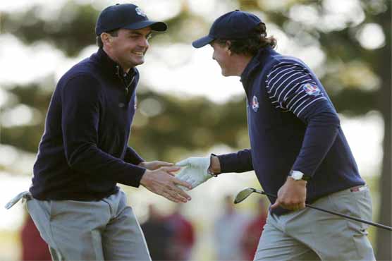 Poulter keeps Europeans in the hunt at Ryder Cup