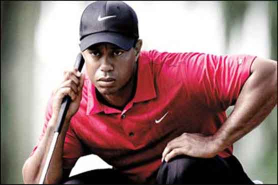 Golf: Woods stays top of world ranking
