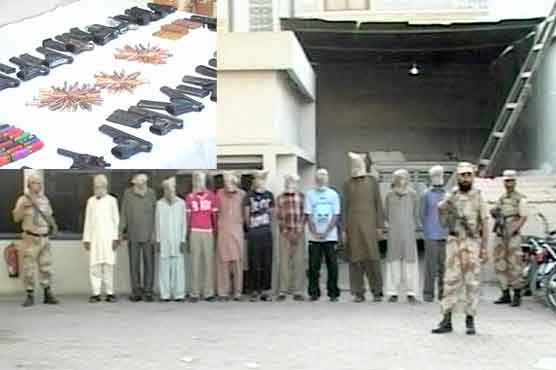 Rangers nab 12 suspects, recover arms in Karachi