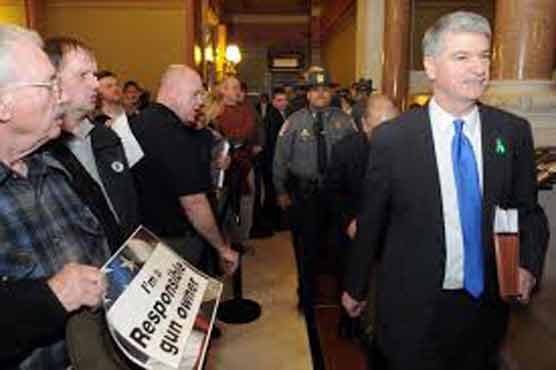 Gun measures OKed in US state where children shot