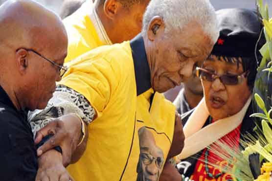 Mandela is 'fine,' getting better in hospital, wife says