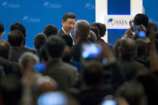 China's Xi offers to reduce friction over hotspots 