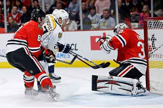 Blackhawks clinch playoff spot with win over Preds 