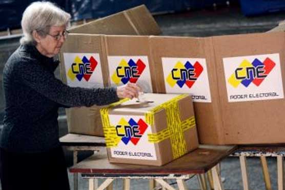 Under Chavez shadow, Venezuelan to pick new leader