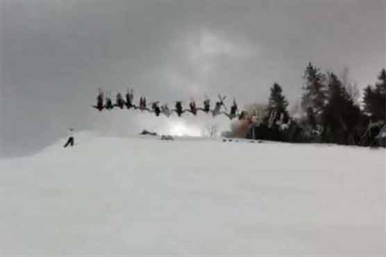 30 skiers perform simultaneous backflip in Canada 