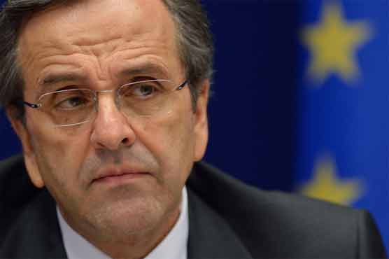 Greece sticks with austerity, seeks debt relief