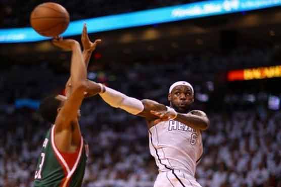 Heat burn Bucks in playoff opener