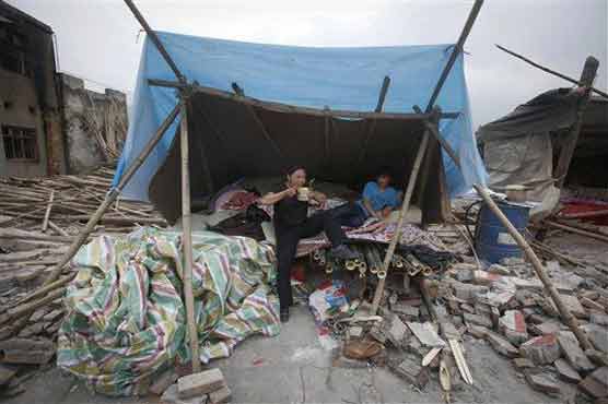 China rushes relief after Sichuan quake kills 188 