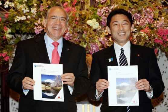 OECD welcomes Japan revival effort, warns on debt