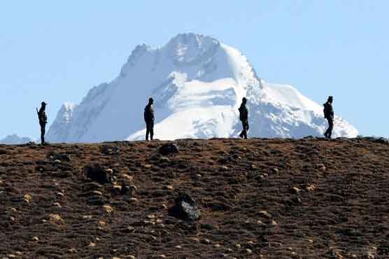 India asks China to withdraw troops from disputed border