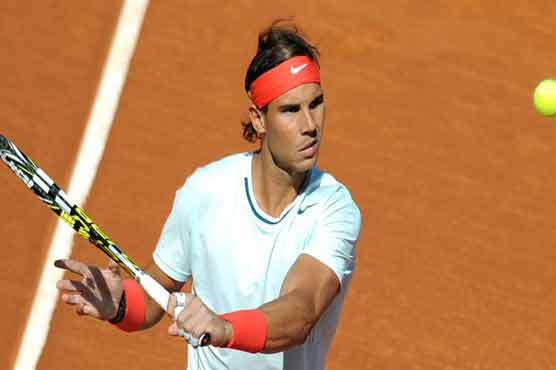 Top-seed Ferrer out, Nadal sees off Berlocq
