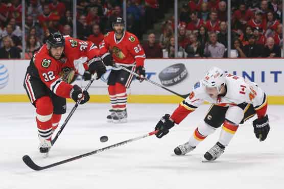Blackhawks overcome Flames 3-1 