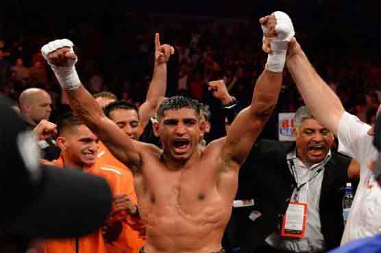 Boxing: Amir Khan picks himself up to beat Diaz