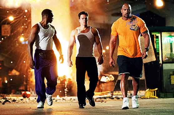 'Pain & Gain' muscles to top of US box office