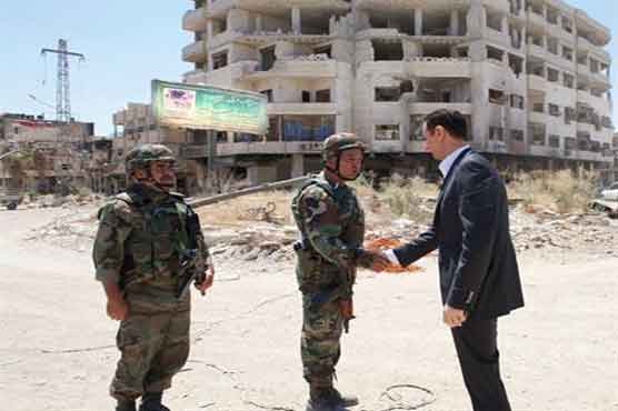  Assad visits troops in Damascus suburb: Syrian TV