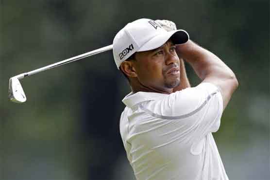 Woods surges seven strokes clear at Firestone