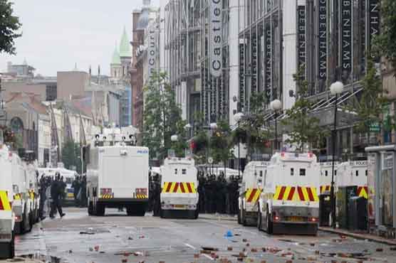Police decry Belfast 'anarchy' as 56 officers hurt 