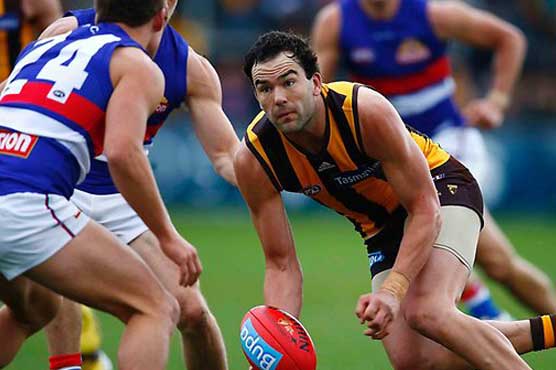 1st-place Hawthorn returns to winning ways in AFL 