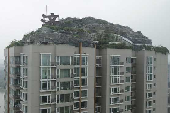 Beijing cracks down on bizarre apartment-top villa