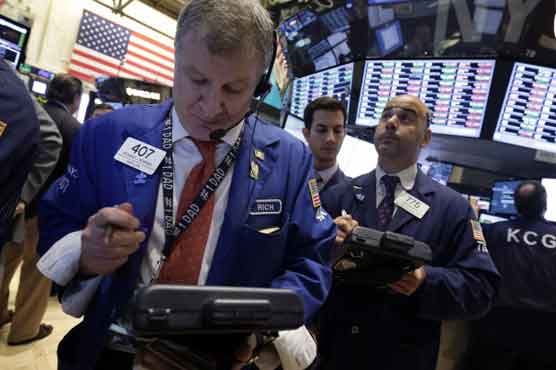 US futures slide before new economic data