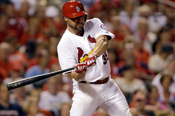 Cardinals beat Pirates in 12 to tighten NL Central 