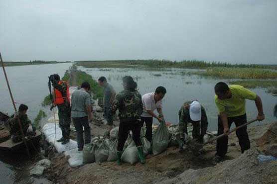 Floods in China's northeast kill 25
