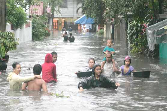 Floods cover more than half of Philippine capital