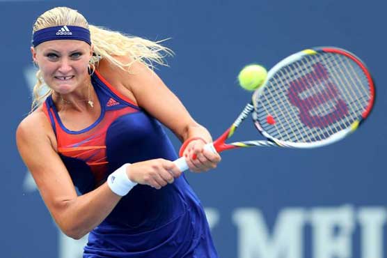 Kvitova advances, Kerber upset at New Haven Open