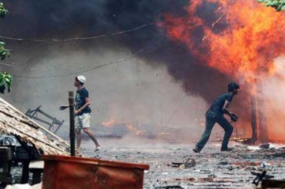 Buddhists in Myanmar torch Muslim homes and shops 