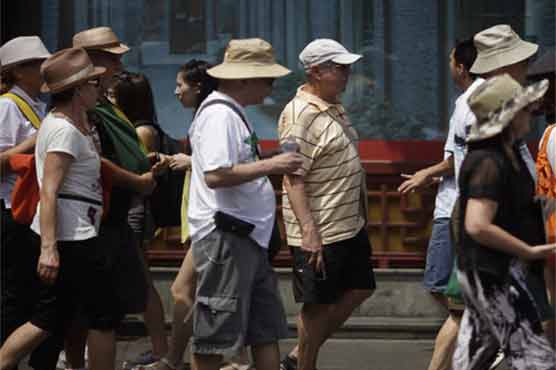 Japan tourist visits to Beijing halved amid stress 