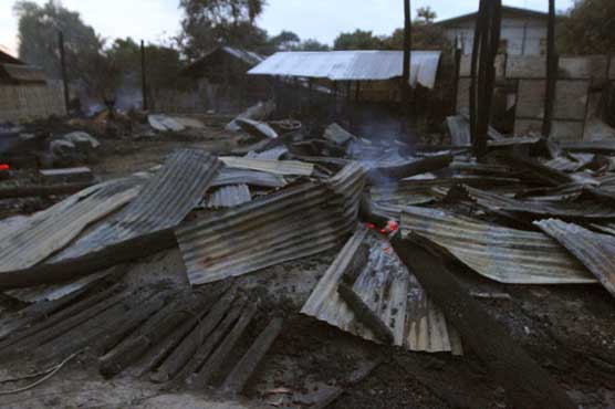 Buddhists in Myanmar torch Muslim homes and shops