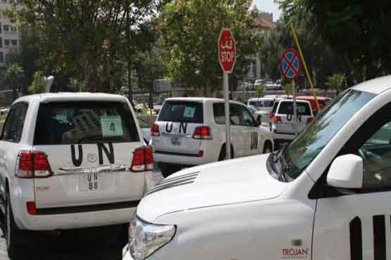 Syria: UN inspectors' convoy hit by sniper fire