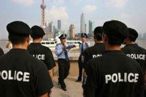 China arrests British, American investigators