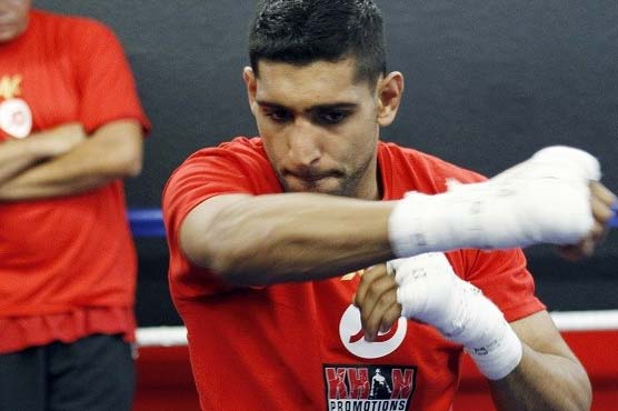 Boxing: Khan will be at Alexander fight, but not in the ring   