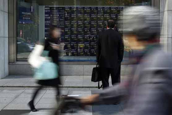 Asian stock markets down but Japan up on weak yen