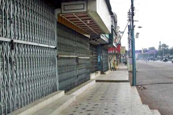 Karachi mourns while two more terrorists held